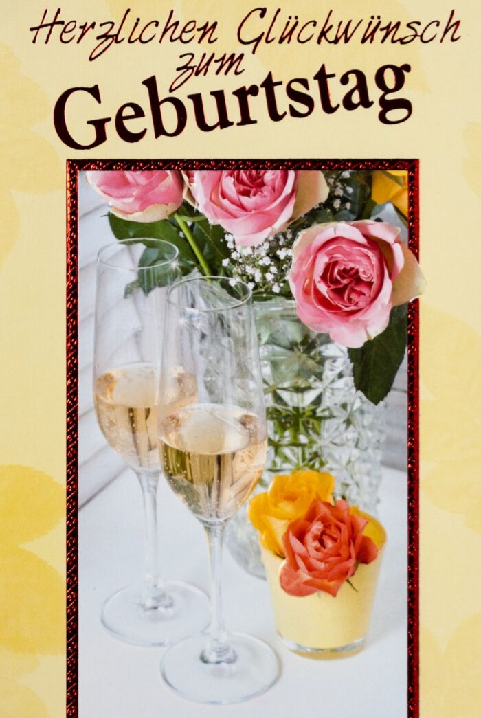 Glückwunsch mit Sekt und Rosen